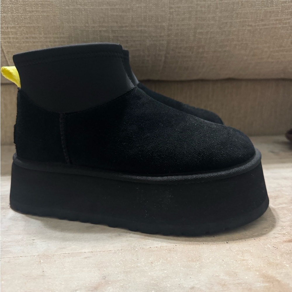 UGG Black Ankle Boots with Yellow Accent